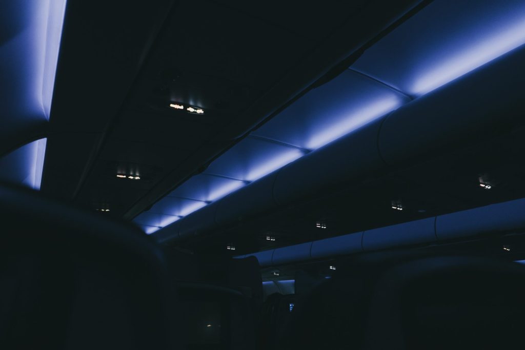 The interior of a vehicle with blue lights
